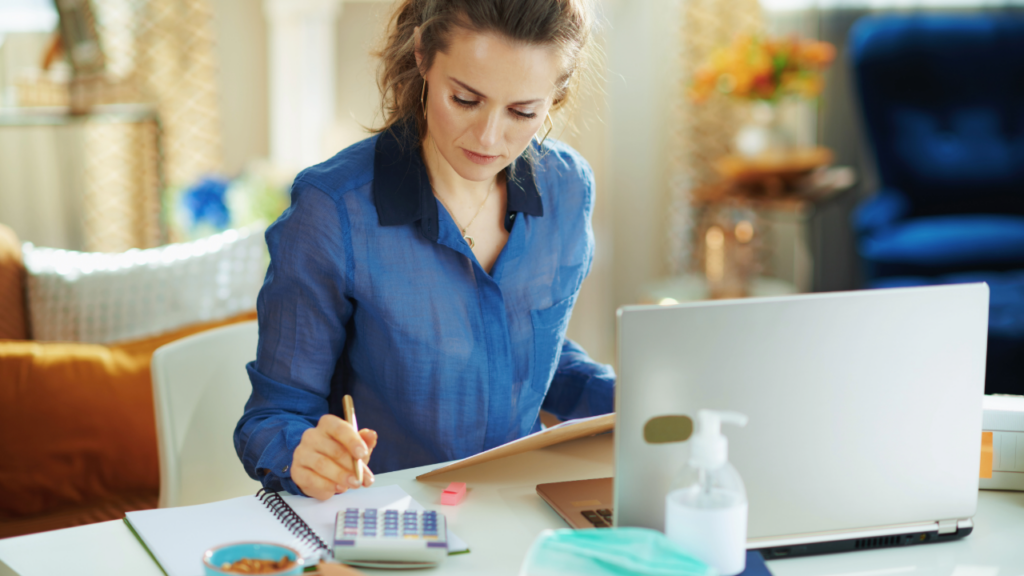 Adobe Stock - Woman working on laptop