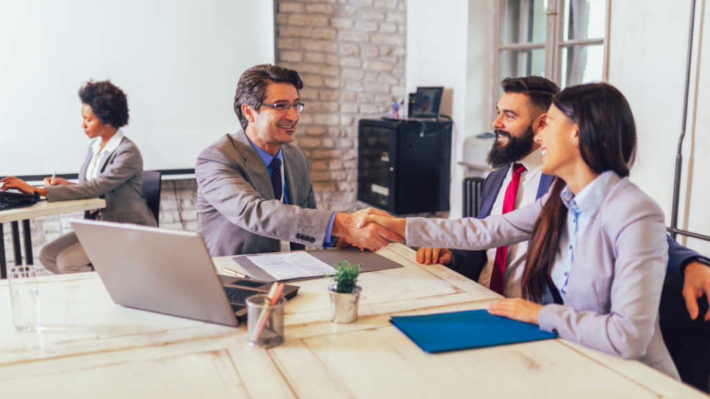 Adobe Stock - Couple Listening to Man working on Laptop