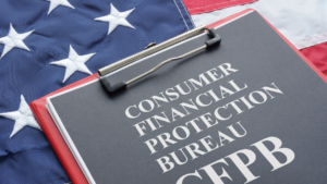 Consumer Financial Protection Clipboard on top of United States Flag